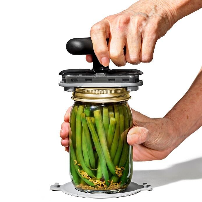 Twisting Jar Opener With Basepad - US 6022
